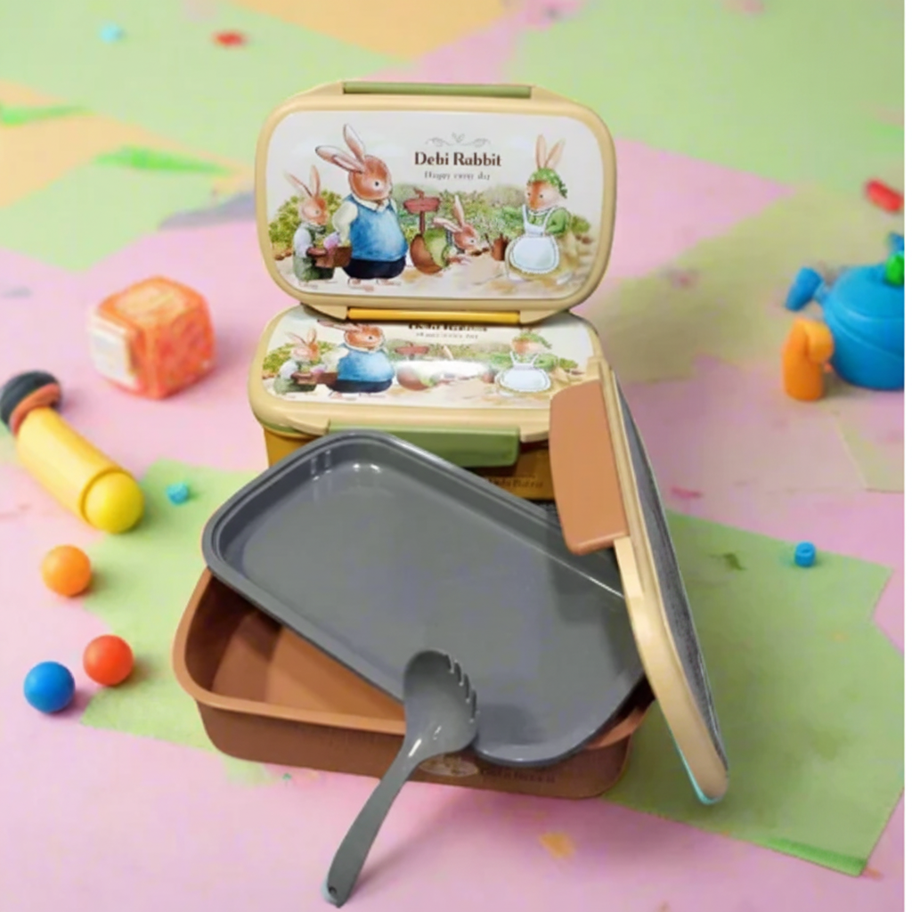 Debi Rabbit lunch box opened - toys background